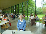 A Williamson 'Friend' having lunch in the café, with Anya Gallaccio's sculptural tree in the background.